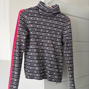 Maeve Patterned Turtleneck Sweater with Neon Pink and Orange arm stripe
